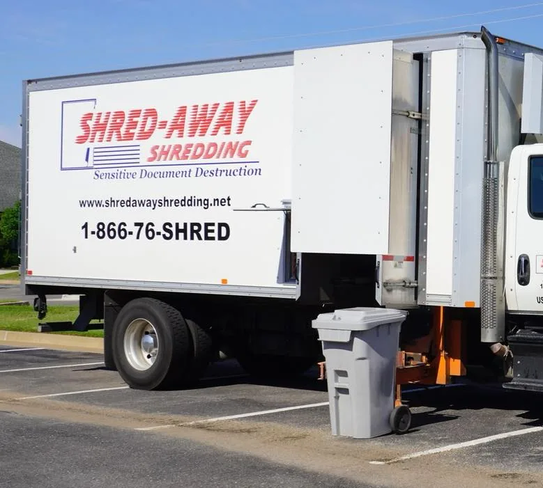 The shredding truck working at a customer's building.